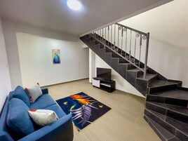 Superior Duplex, Balcony, City View | Living area | TV