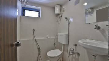 Deluxe Double Room, City View | Bathroom | Shower, free toiletries, towels, soap