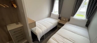 Relax at our lodge with a hot tub and breathtaking views your perfect escape!