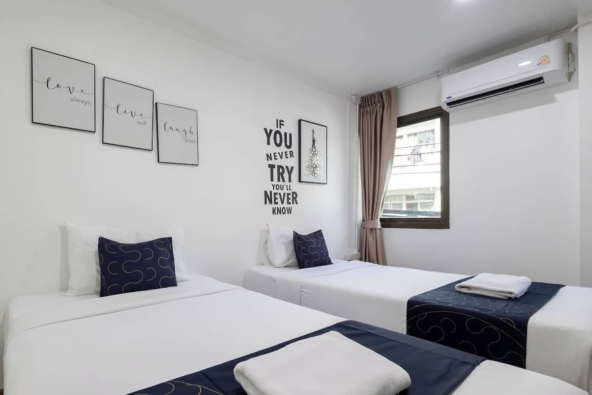 Standaard Twin kamer | Een bureau, gratis wifi, beddengoed
