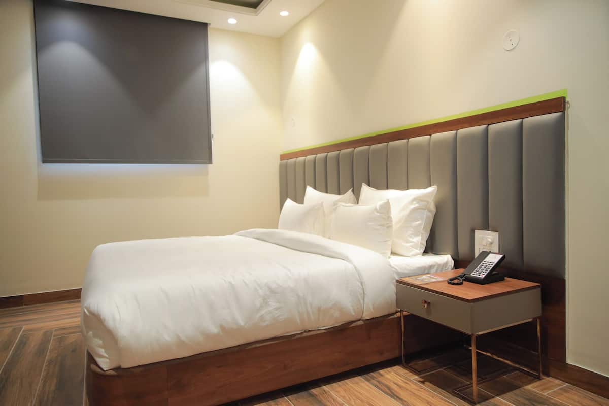 Premium bedding, memory-foam beds, minibar, in-room safe