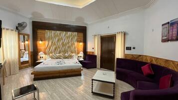 Laptop workspace, bed sheets