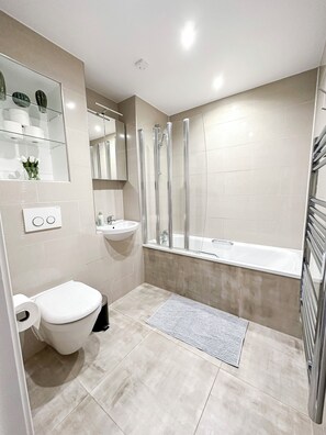 Hair dryer, towels, soap, shampoo