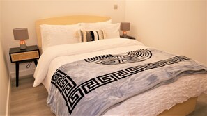 2 habitaciones, tabla de planchar con plancha, wifi y ropa de cama
