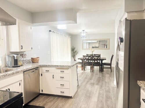 Beautiful Home in quiet neighborhood with a pool and close to stores & highways.