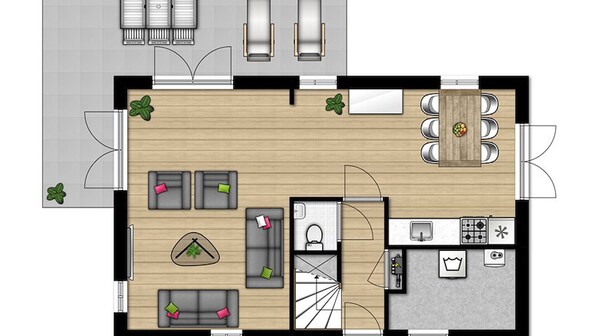 Un plan d’étage d’une chambre d’hôtel comprenant un espace de vie, une table à manger, une cuisine et une salle de bain.