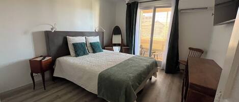 1 chambre, fer et planche Ă repasser, Wi-Fi gratuit, draps fournis