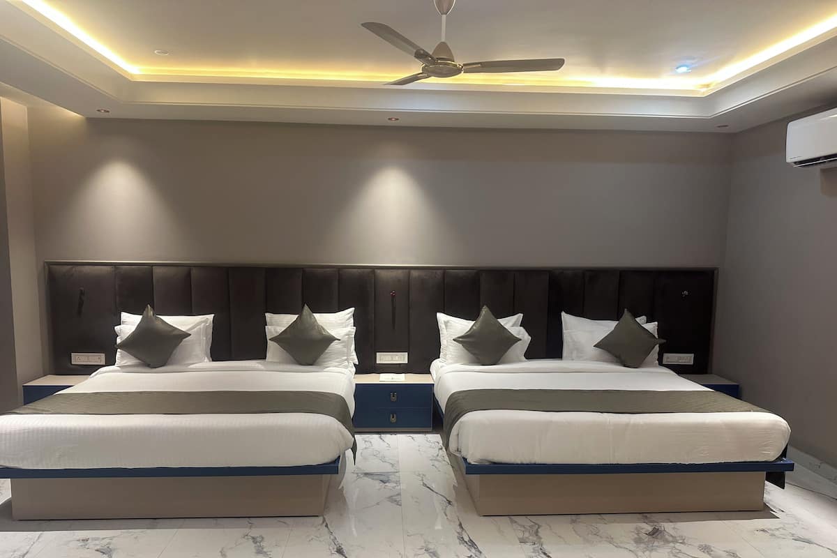 Family Quadruple Room, City View | Laptop workspace, free WiFi