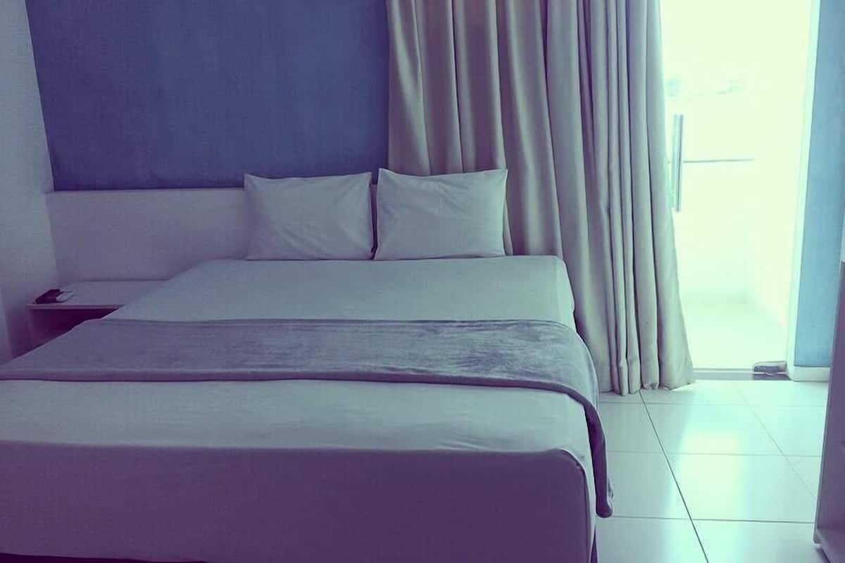 Kamer, 1 kingsize bed | Een bureau, een laptopwerkplek, gratis wifi, beddengoed