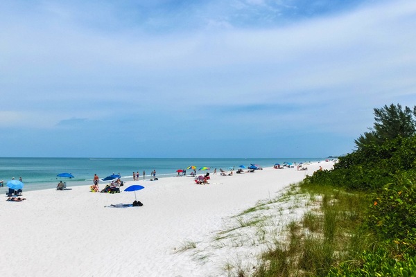 On the beach, sun loungers, beach towels