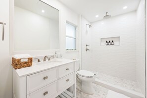 Shower, hair dryer, towels, soap