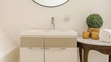 Shower, jetted tub, hair dryer, bidet