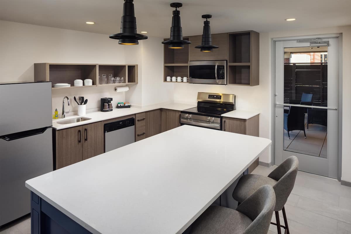 Suite, 1 King Bed, Balcony | Desk, laptop workspace, blackout drapes, iron/ironing board