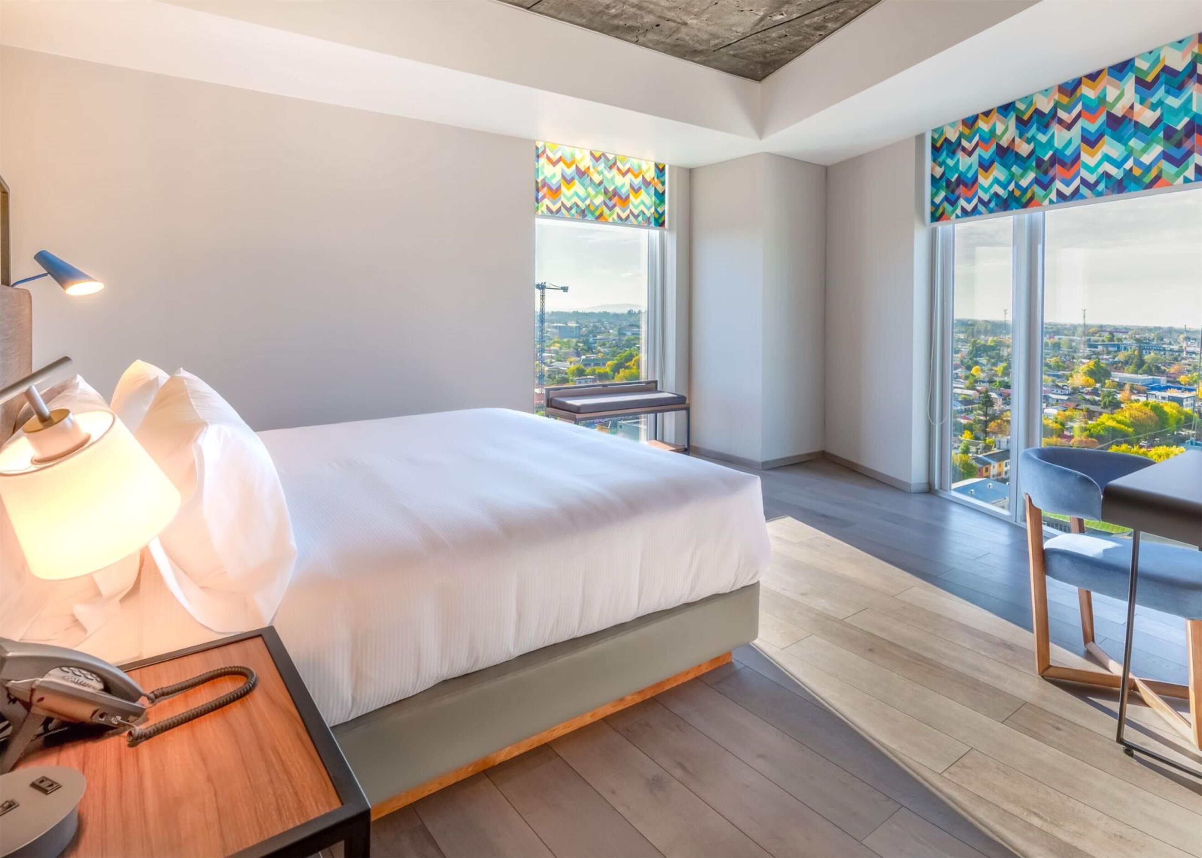 Premium bedding, desk, laptop workspace, free WiFi