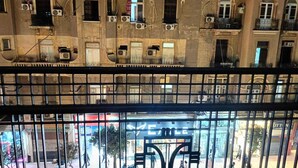 A view of a building with multiple balconies and air conditioning units. - Olivia Hotel (Cairo)