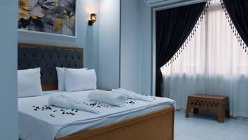 Hypoallergeen beddengoed, bedden met traagschuimmatrassen, een minibar