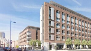A modern hotel with a brick facade, multiple floors, and a row of windows. - For Students Only Hope St near Liverpool Central Station (Liverpool)
