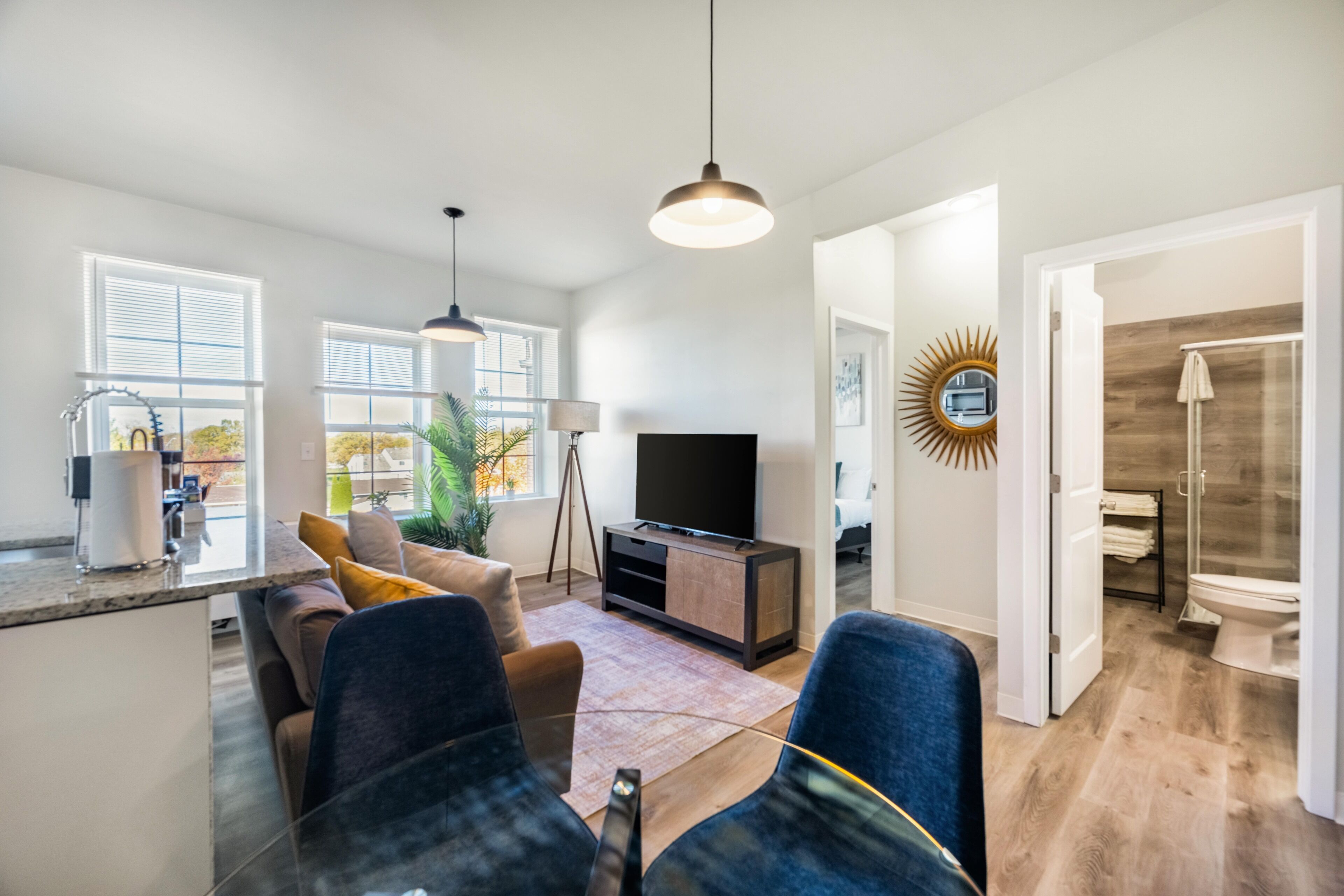 Superior Apartment | Living area | 70-inch Smart TV with digital channels