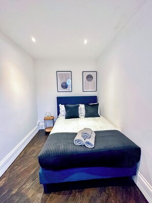 1 bedroom, desk, iron/ironing board, travel cot