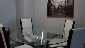 Family Apartment, 2 Bedrooms, Balcony, City View | In-room dining