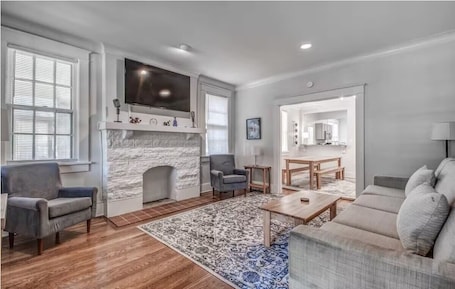 Deluxe House, Patio | Living area | TV