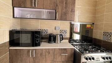 Fridge, microwave, oven, coffee/tea maker