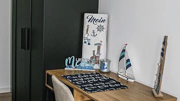 Premium bedding, desk, laptop workspace, free WiFi