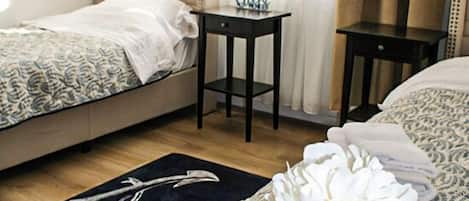 Premium bedding, desk, laptop workspace, free WiFi