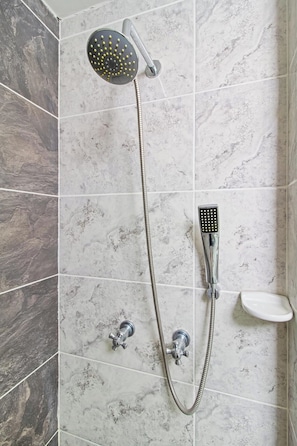 Shower, hair dryer, towels, soap