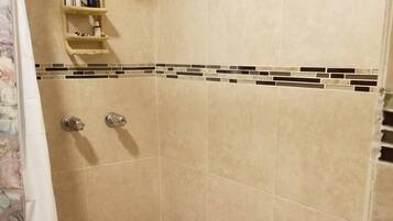 Shower, towels, soap, shampoo