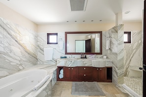 Jetted bath, hair dryer, towels, soap
