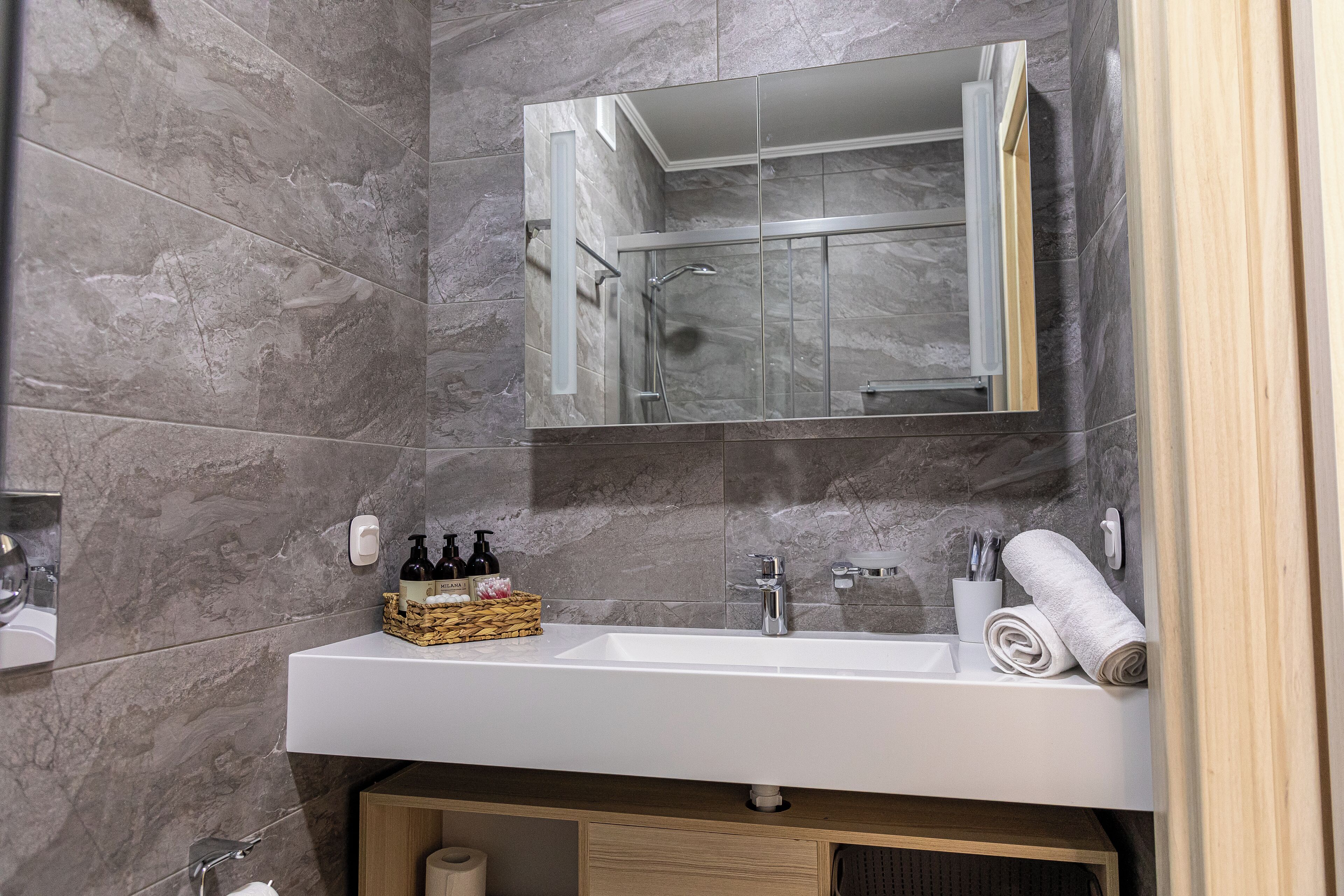 Shower, free toiletries, hair dryer, slippers