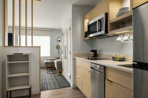 Desk, laptop workspace, iron/ironing board, free cots/infant beds