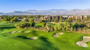 A golf course with bunkers and a building complex in the background. - Discover Family Fun and Luxury at The Westin Desert Willow Villas – 1 Bd Premium (Palm Desert)