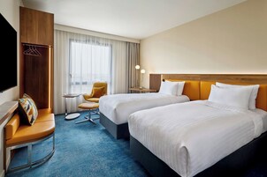 Ropa de cama de alta calidad y minibar 