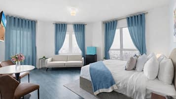 Deluxe-Studiosuite, 1 King-Bett und Schlafsofa | Hochwertige Bettwaren, Zimmersafe, laptopgeeigneter Arbeitsplatz