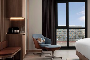 Room, 1 King Bed, Pool View (Corner) | Minibar, in-room safe, desk, laptop workspace - Courtyard By Marriott Dakar Diamniadio (Diamniadio)