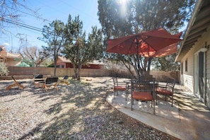 Multiple seating areas to enjoy the backyard