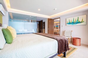 2 habitaciones, escritorio y tabla de planchar con plancha