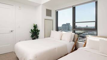 1 bedroom, desk, iron/ironing board, travel crib