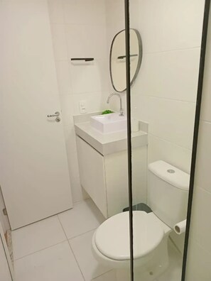 Shower, towels, toilet paper