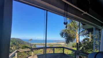Honeymoon House, Fireplace, Beach View | Room amenity