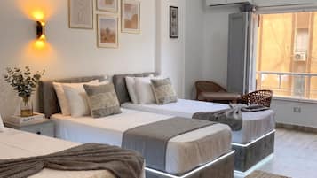 Classic Triple Room, City View | Soundproofing, free WiFi, bed sheets, wheelchair access