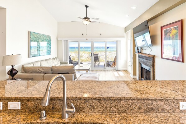 TV, fireplace - Portside Villa #36 Pet-Friendly Beachfront Haven By DogBeach (Pensacola Beach)