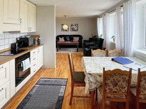 Apartamento | Cozinha privada | Cadeirão de bebê