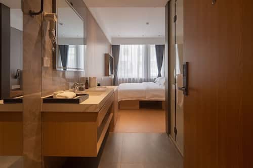 Premium bedding, blackout curtains, soundproofing, free WiFi