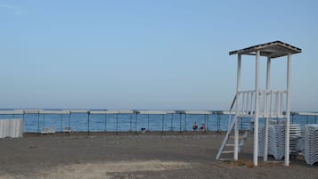 Praia particular, prática de vôlei de praia