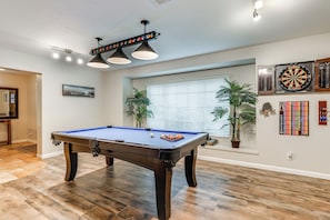 Enjoy a game of pool or test your aim at the dartboards in this lively indoor recreation area.