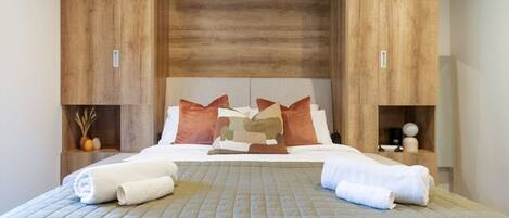 1 dormitorio, tabla de planchar con plancha, wifi gratis y ropa de cama