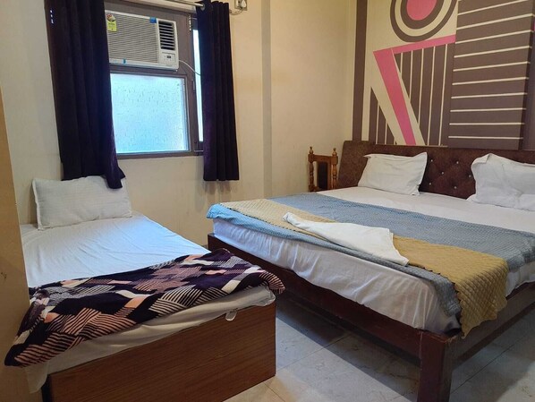 Habitació triple Deluxe | Wifi gratuïta